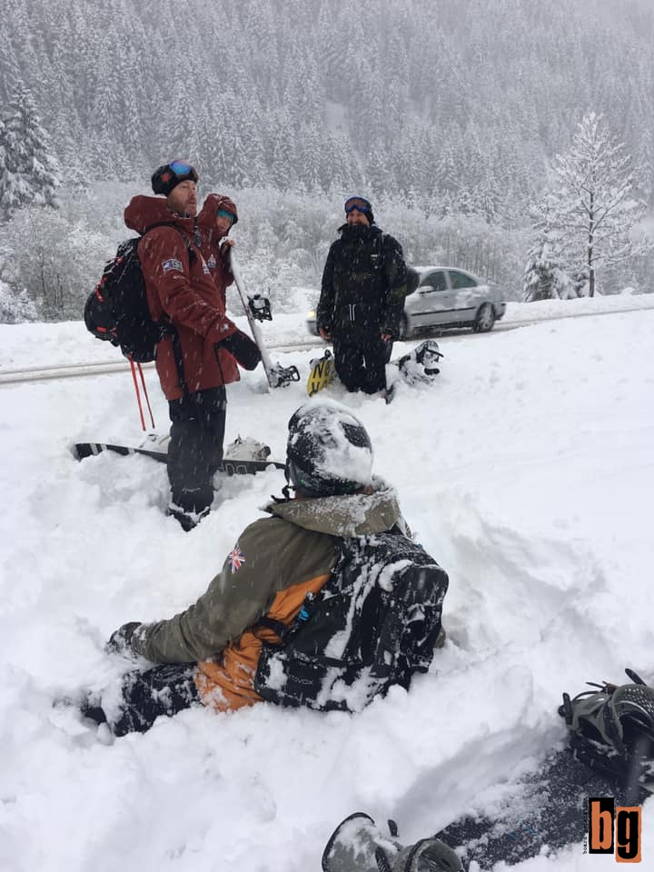 Snowboarders in powder snow