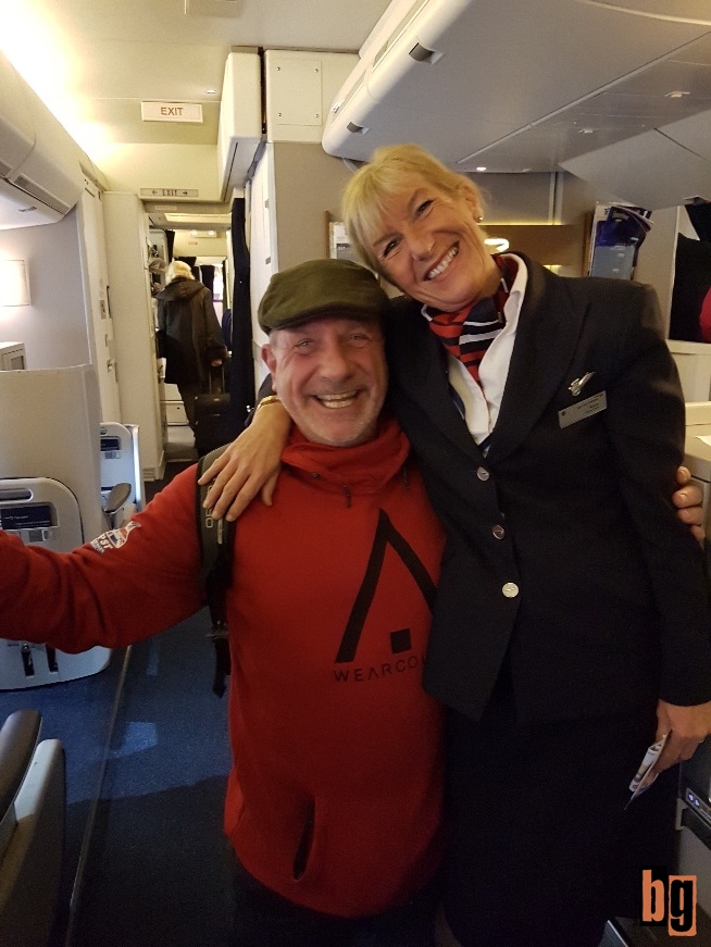 Swifty psoing with a stewardess